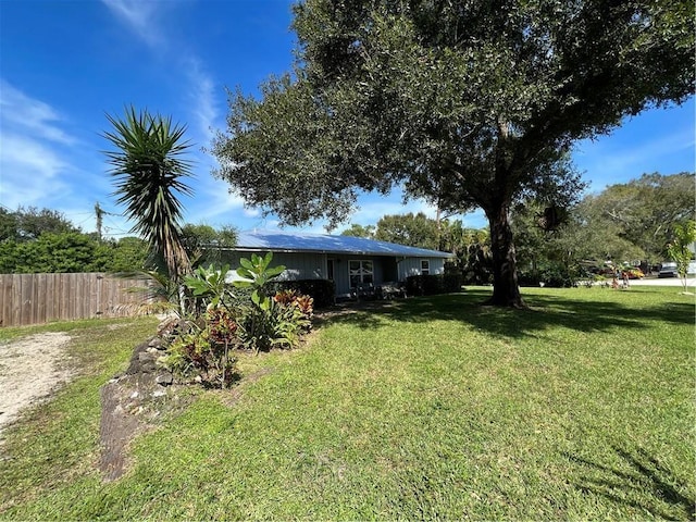 view of yard with fence