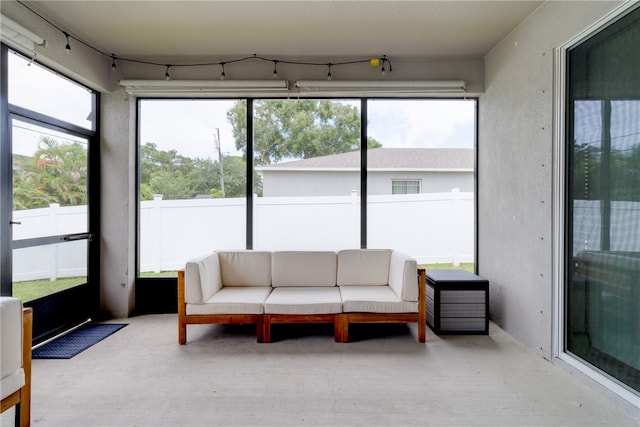 sunroom / solarium featuring plenty of natural light