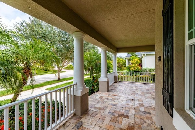 view of patio featuring a porch