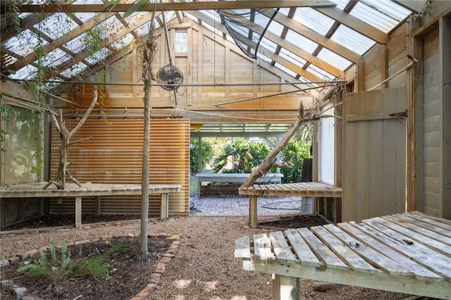 exterior space featuring lofted ceiling and a wealth of natural light