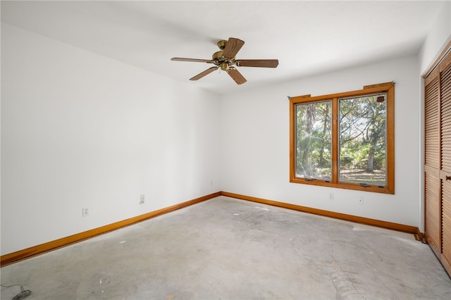 unfurnished room with ceiling fan