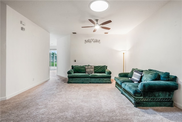 living room with carpet and ceiling fan