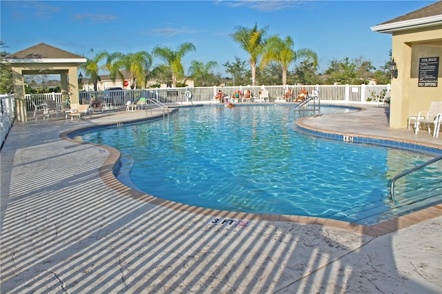 view of pool featuring a patio area