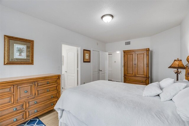 bedroom featuring light wood-type flooring