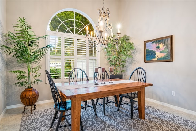 dining space with a chandelier