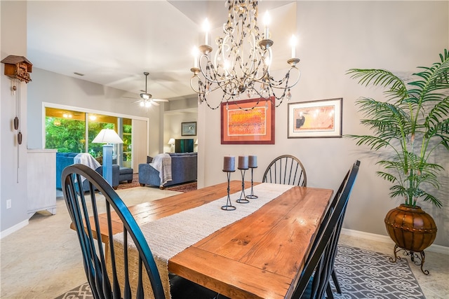 dining room with ceiling fan with notable chandelier