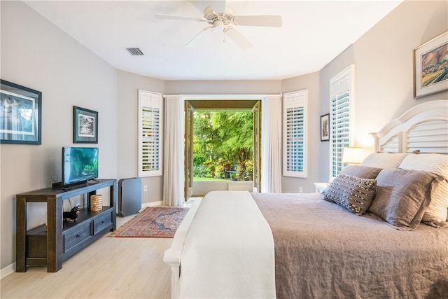 bedroom featuring ceiling fan and light hardwood / wood-style flooring