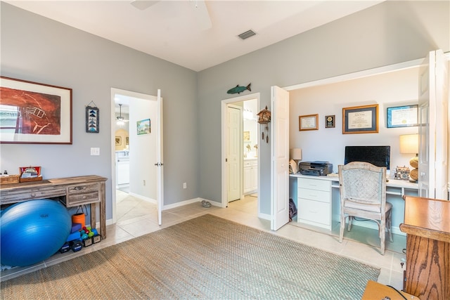 office with ceiling fan and light tile patterned floors