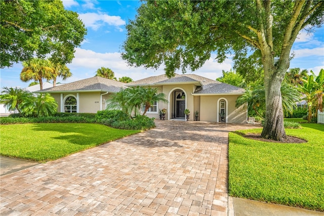 view of front of home with a front yard