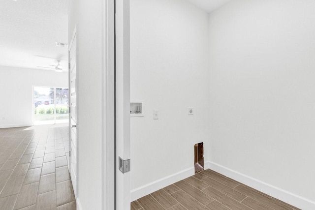8050 96th Ave, Vero Beach, FL 32967 - laundry room featuring electric dryer hookup, washer hookup, and baseboards