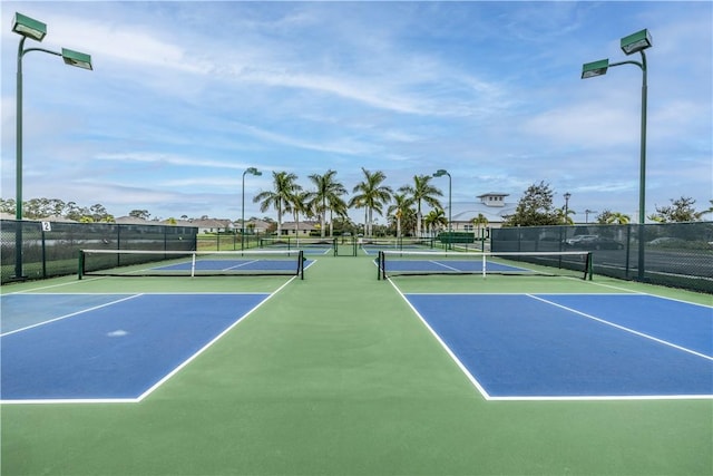 5964 Long Leaf Ln, Vero Beach, FL 32966 - view of tennis court featuring fence and community basketball court