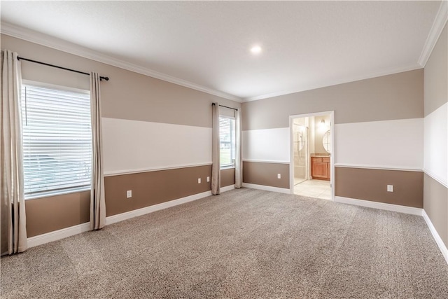 5964 Long Leaf Ln, Vero Beach, FL 32966 - spare room featuring ornamental molding, light carpet, and baseboards