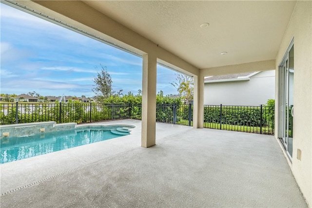 view of pool with a patio