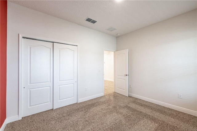 unfurnished bedroom with a closet