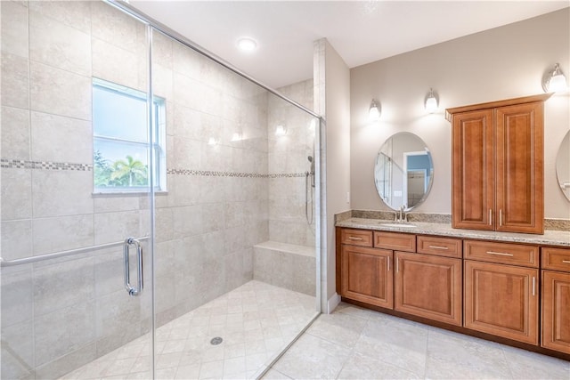 5964 Long Leaf Ln, Vero Beach, FL 32966 - bathroom with a shower stall, vanity, and tile patterned flooring