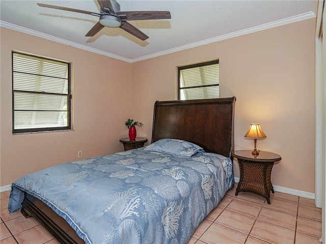 tiled bedroom featuring multiple windows, ceiling fan, and crown molding