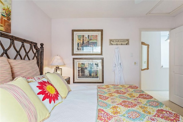 bedroom with light colored carpet