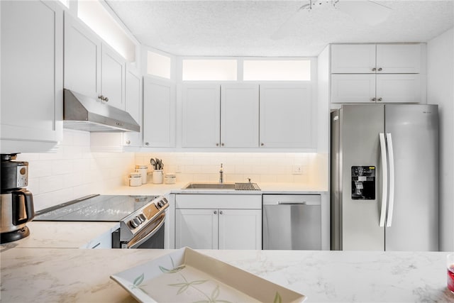 kitchen featuring white cabinetry and appliances with stainless steel finishes