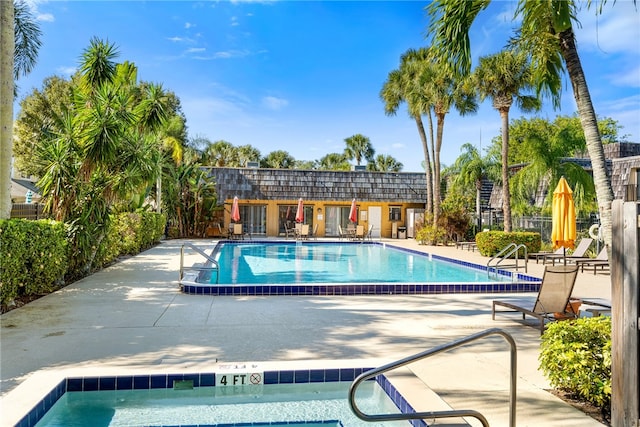 view of swimming pool featuring a patio