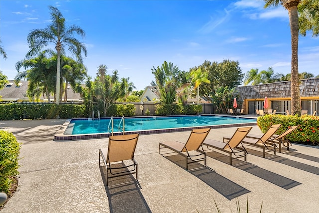 view of pool featuring a patio area