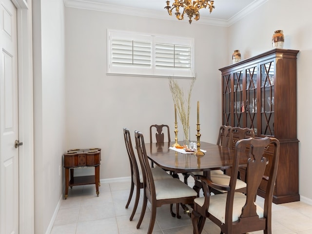 dining area featuring light tile patterned floors, a chandelier, and ornamental molding