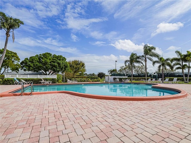 pool with a patio area