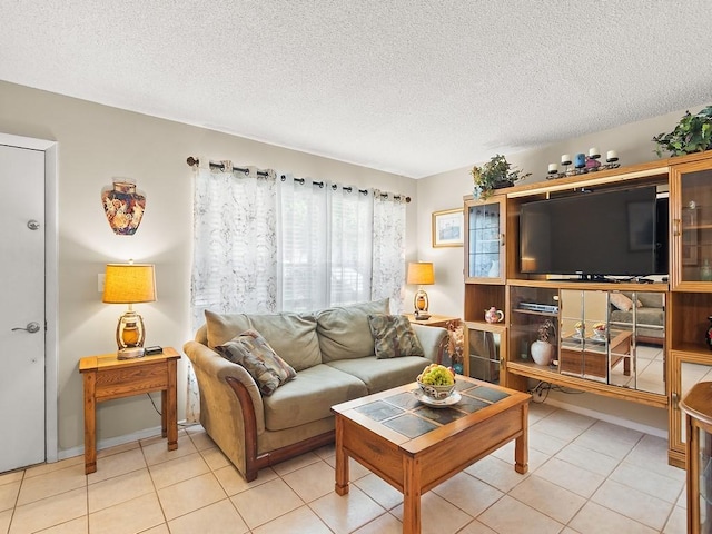 2800 Indian River Blvd Unit 2S, Vero Beach, FL 32960 - living room with a textured ceiling and light tile patterned floors