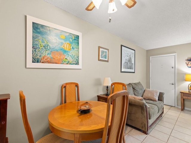 2800 Indian River Blvd Unit 2S, Vero Beach, FL 32960 - dining area featuring ceiling fan, light tile patterned flooring, and a textured ceiling