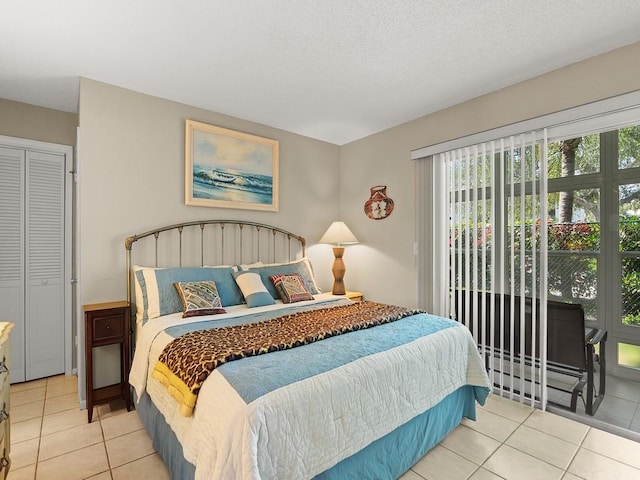 2800 Indian River Blvd Unit 2S, Vero Beach, FL 32960 - bedroom with tile patterned flooring and access to outside