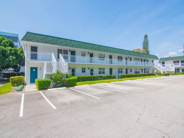 2800 Indian River Blvd Unit 2S, Vero Beach, FL 32960 - view of building exterior with uncovered parking