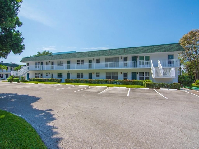 2800 Indian River Blvd Unit 2S, Vero Beach, FL 32960 - view of building exterior with uncovered parking