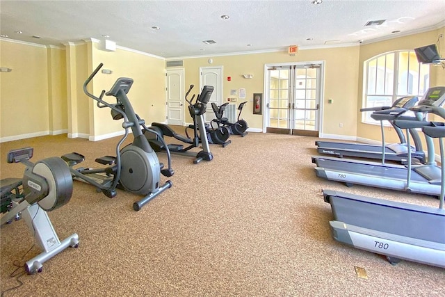 gym featuring crown molding, a textured ceiling, and french doors