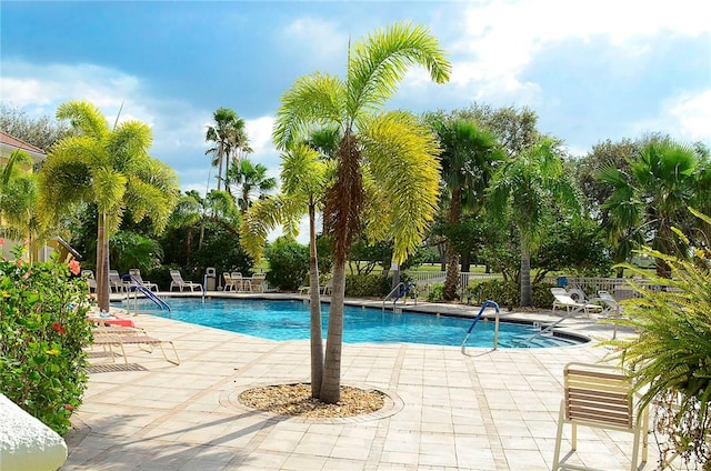 view of swimming pool featuring a patio