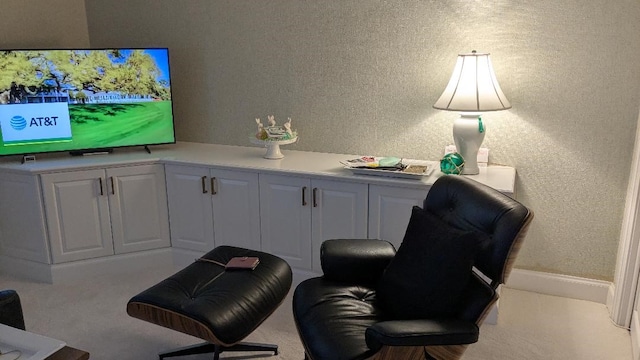 1903 Bay Rd Unit 206, Vero Beach, FL 32963 - living area featuring a textured wall