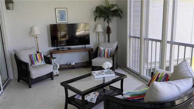 1903 Bay Rd Unit 206, Vero Beach, FL 32963 - living room featuring tile patterned floors