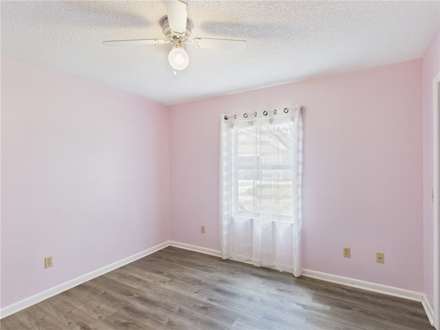 108 Cardinal Dr, Sebastian, FL 32958 - unfurnished room featuring wood finished floors, a ceiling fan, and a textured ceiling