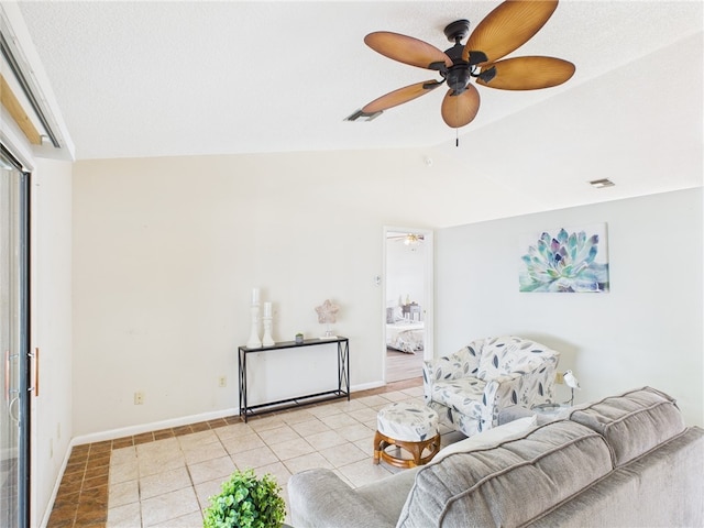 108 Cardinal Dr, Sebastian, FL 32958 - living area featuring a ceiling fan, vaulted ceiling, and tile patterned floors