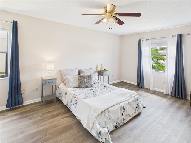 108 Cardinal Dr, Sebastian, FL 32958 - bedroom featuring wood finished floors and a ceiling fan