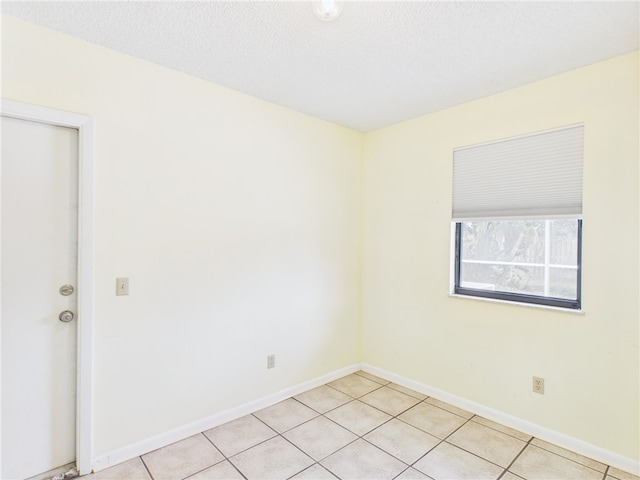 108 Cardinal Dr, Sebastian, FL 32958 - unfurnished room with light tile patterned floors and baseboards