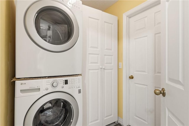 1359 Damask Ln, Sebastian, FL 32958 - laundry room featuring stacked washer and clothes dryer