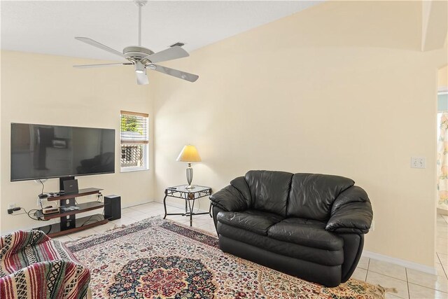1359 Damask Ln, Sebastian, FL 32958 - living room with light tile patterned flooring, a ceiling fan, and lofted ceiling