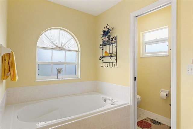 1359 Damask Ln, Sebastian, FL 32958 - bathroom with toilet, a bath, and tile patterned floors