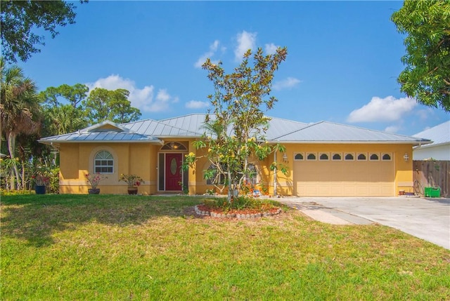 1359 Damask Ln, Sebastian, FL 32958 - single story home featuring a standing seam roof, stucco siding, concrete driveway, and a garage