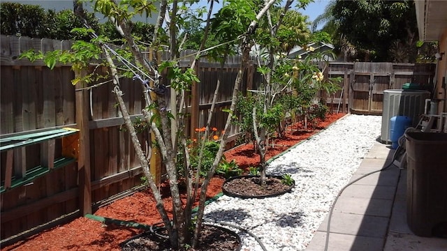 1359 Damask Ln, Sebastian, FL 32958 - fenced backyard with central AC and a patio