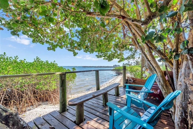 deck featuring a water view