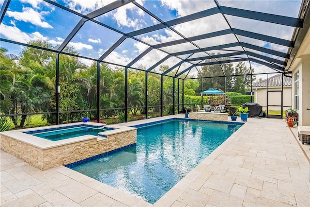 view of swimming pool with a lanai, a patio area, and a pool with connected hot tub