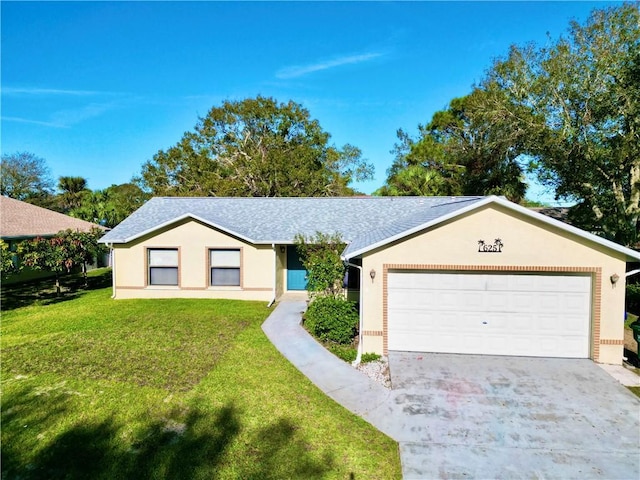 ranch-style house with a garage and a front yard