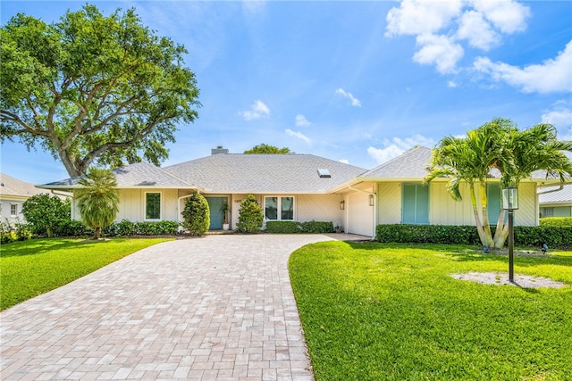 ranch-style house with a front yard