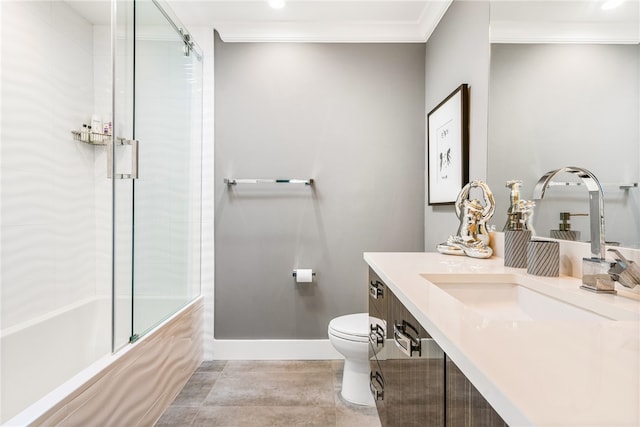 full bathroom featuring vanity, toilet, ornamental molding, and bath / shower combo with glass door