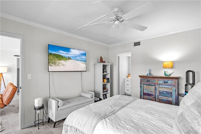 bedroom with ceiling fan, crown molding, and light tile patterned floors